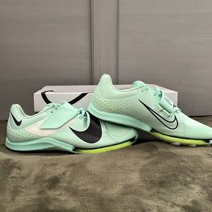 Brand new never worn Nike Long Jump Running shoes.